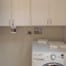 Ridgewood Closets-white-laundry-cabinets