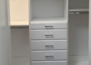 Ridgewood Closets white reach in closet with drawers